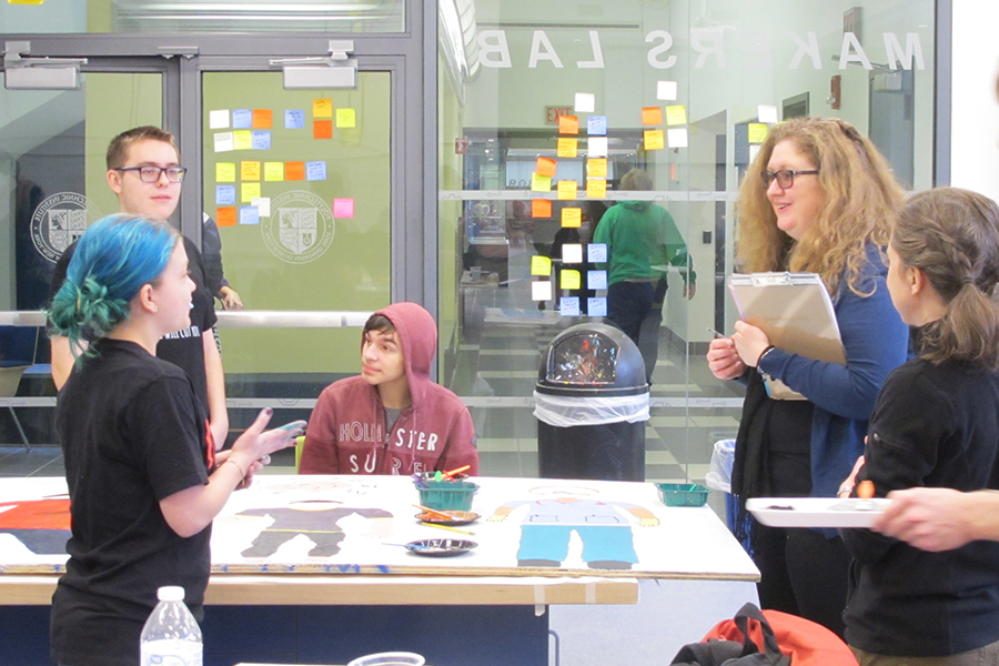 Students collaborate inside the MakerLab