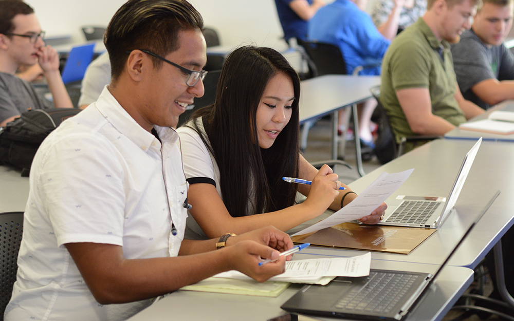 students in class studying together