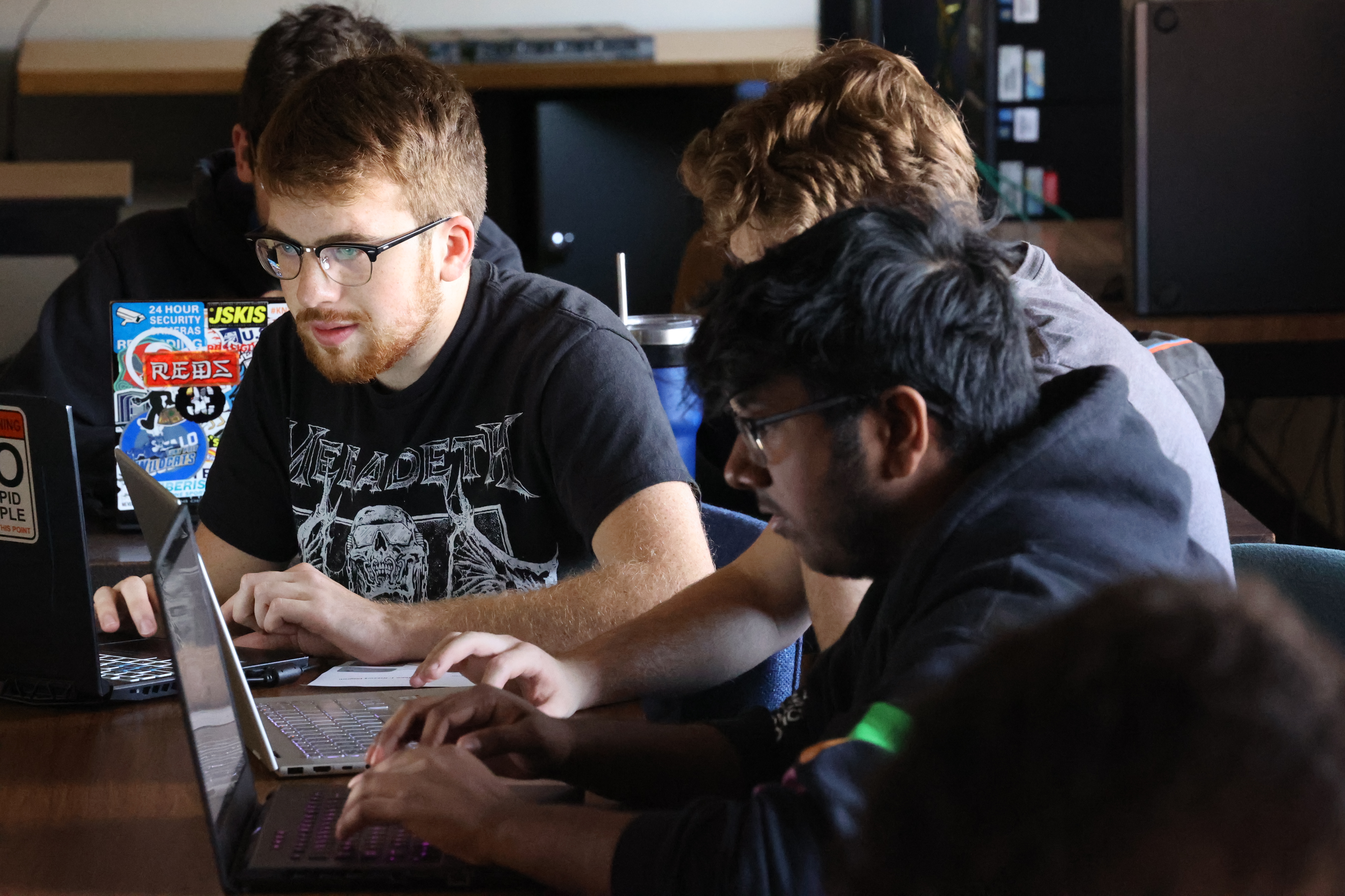 Student works with artificial intelligence technology in research center