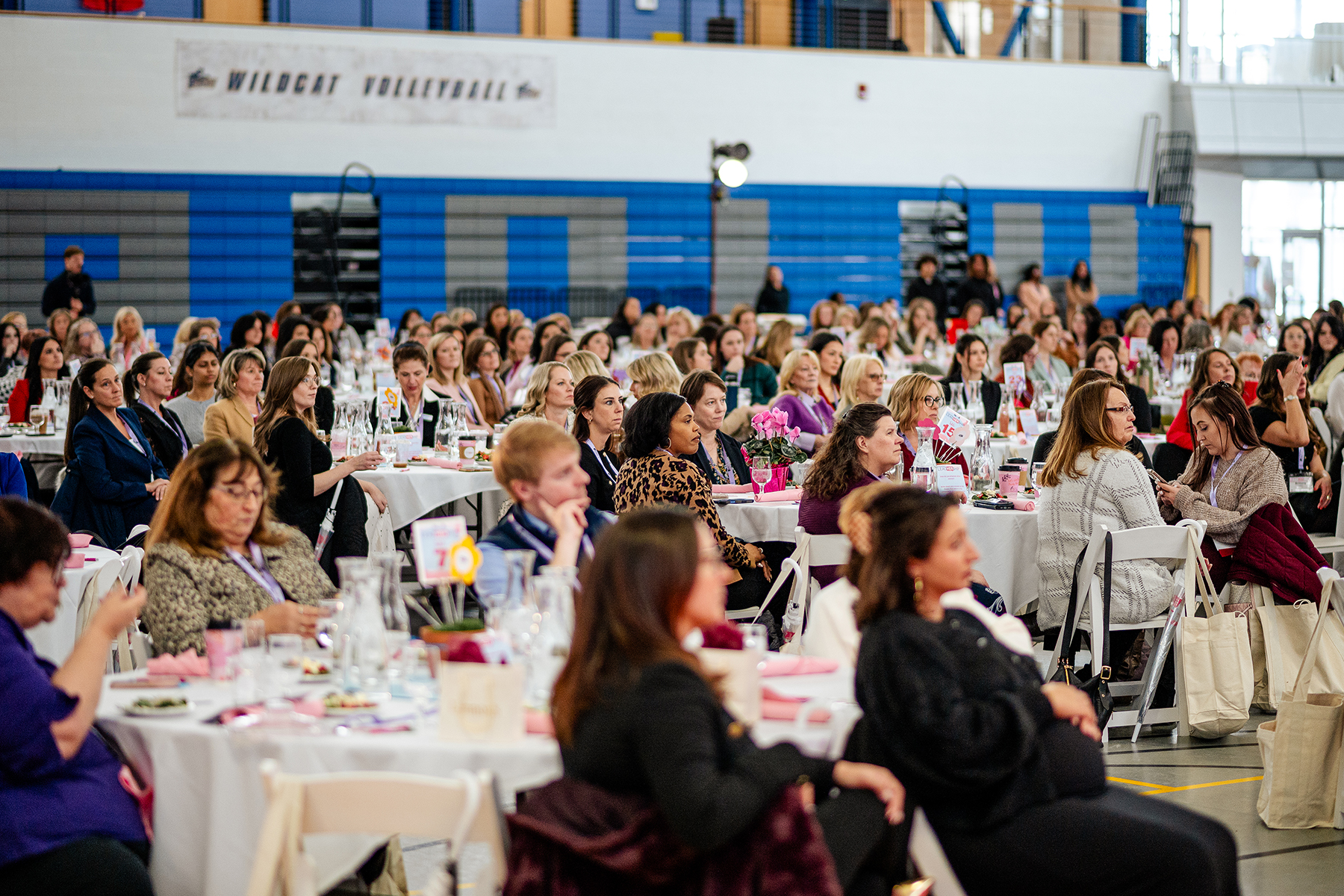 Speaker presenting to an audience during a SUNY Poly event