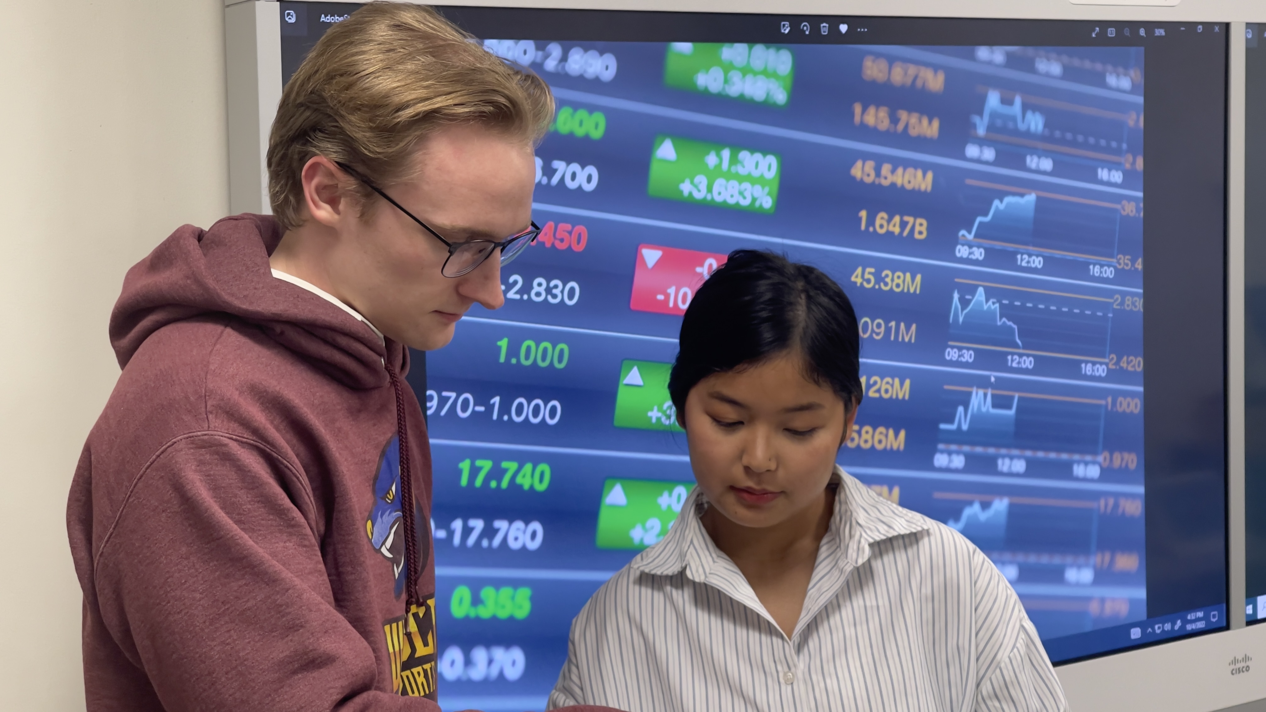 Business students collaborating on a group project
