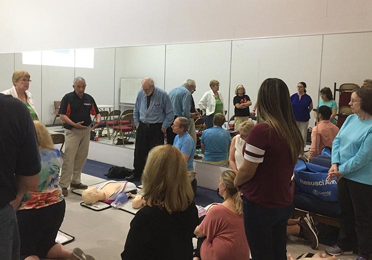 MVILR members and guests learn CPR and are trained on AED machine