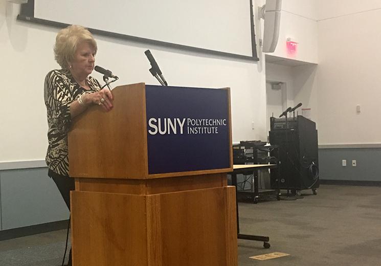 Sylvia Barnes speaks to group