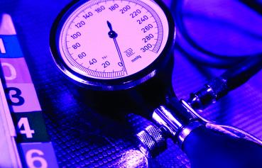 Doctor of Nursing Practice - illustrative photo of blood pressure cuff and folder