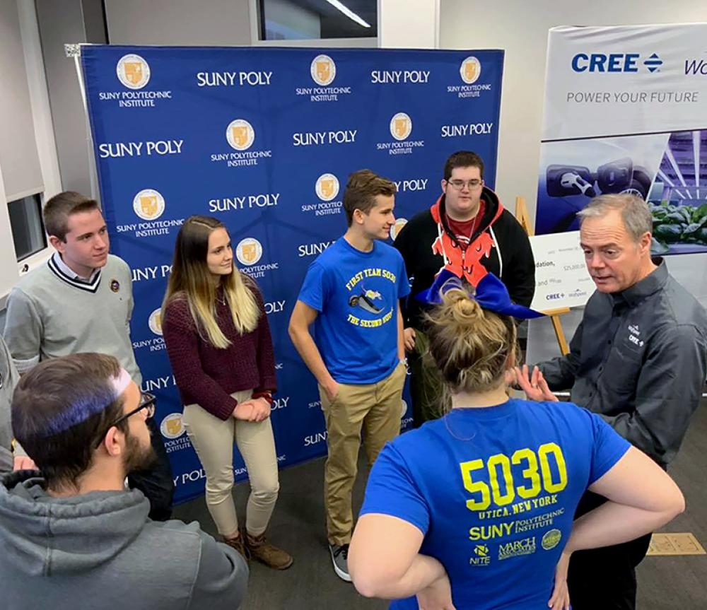 Wolfspeed CEO Gregg Lowe talking with students at SUNY Poly