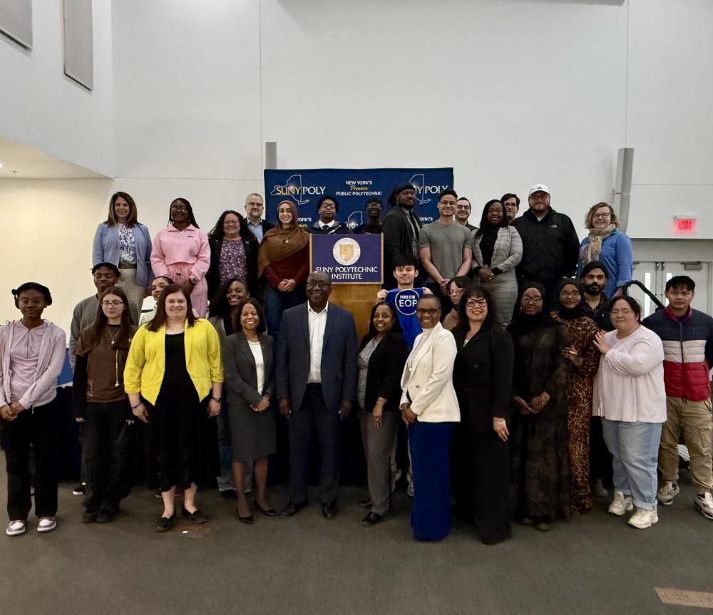 SUNY Poly EOP Students, EOP team, as well as campus leadership and SUNY officials pose for group photo after the event.