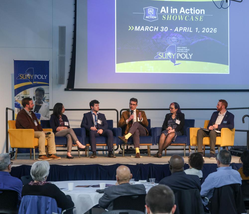 AI panel on workforce featuring six panelists.