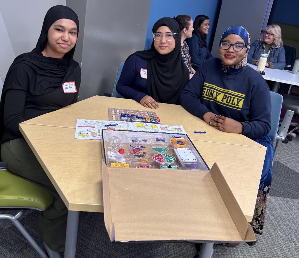 Utica students with SUNY Poly's Sabah Haji