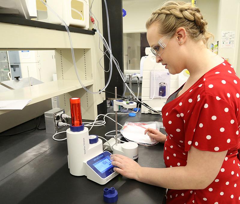 SUNY Poly student in a lab