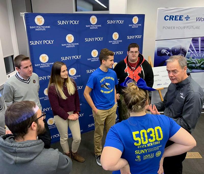 Wolfspeed CEO Gregg Lowe talking with students at SUNY Poly