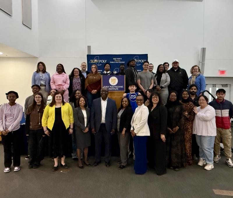 SUNY Poly EOP Students, EOP team, as well as campus leadership and SUNY officials pose for group photo after the event.